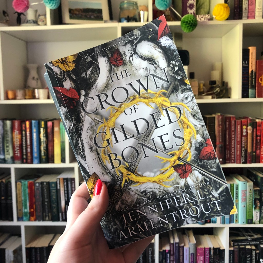 "The Crown of Gilded Bones", the third book in the Blood and Ash series by Jennifer L. Armentrout. 