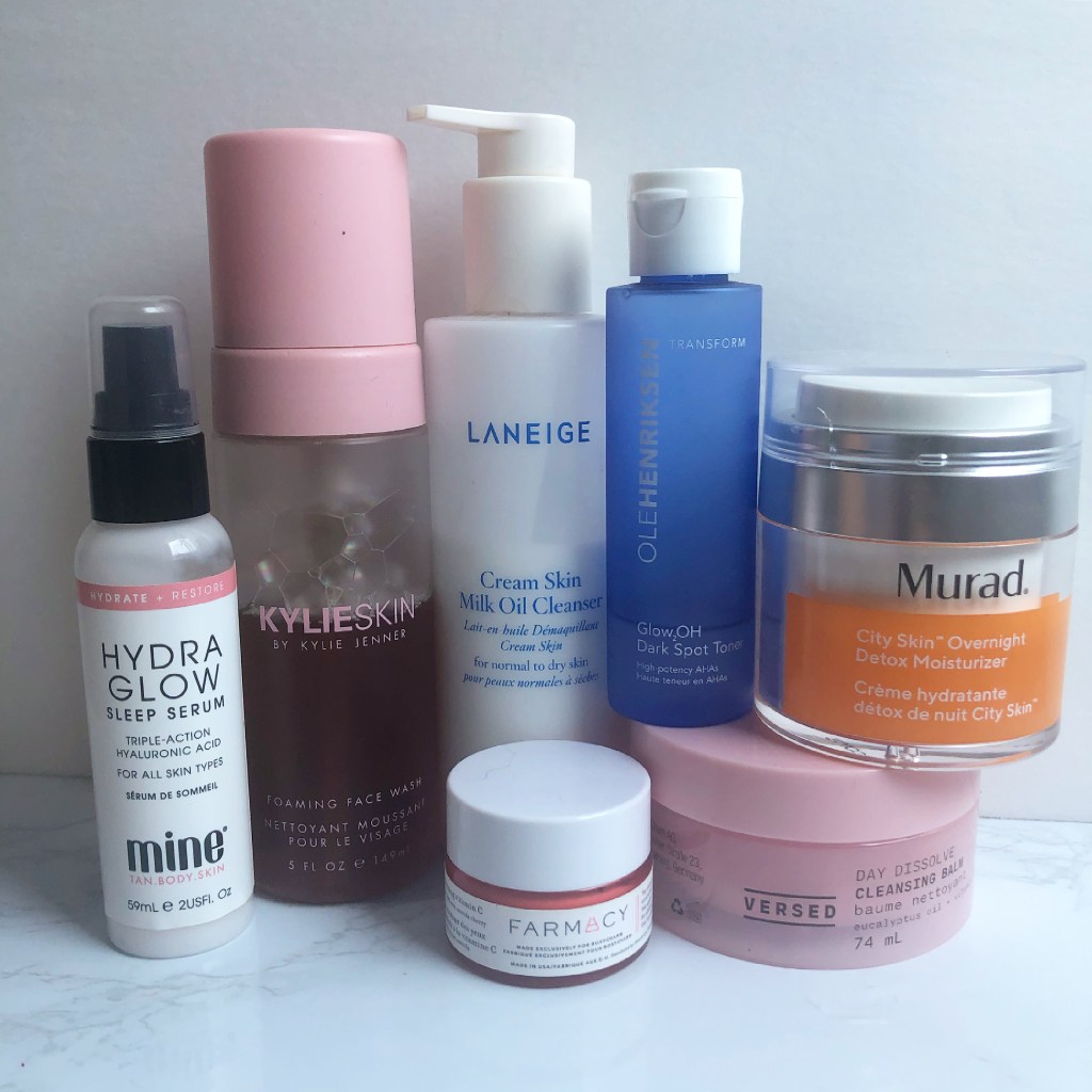 Nighttime skincare routine including: Laneige, Versed and KylieSkin cleansers, OleHenriksen toner, Murad moisturizer, MineTanBodySkin hyaluronic acid and Farmacy eye cream.